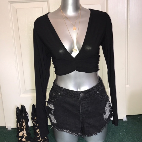 black long sleeve low cut top